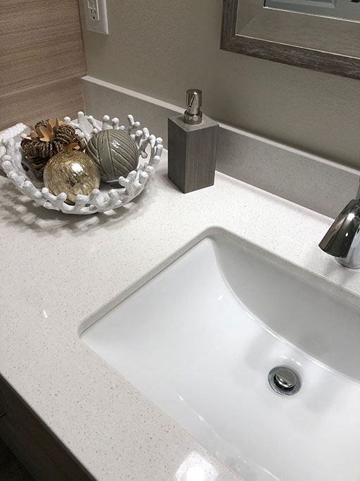 Bathroom quartz counter top and sink at Harbor Heights 55+ Community, Olympia