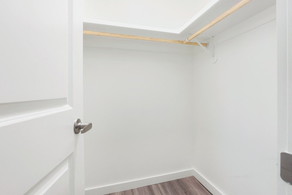 a walk in closet in a 555 waverly unit