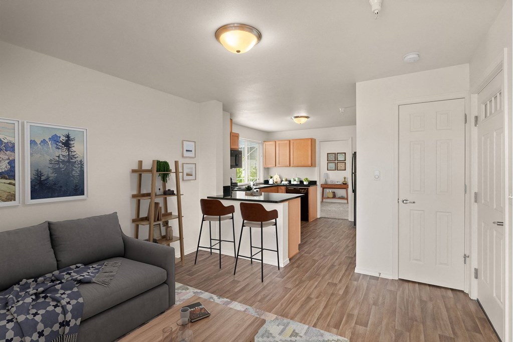 a living room with a couch at Trillium Apartments, Springfield, OR, 97477