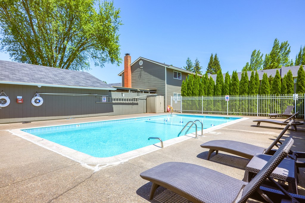 take a dip in the resort style pool at the enclave at woodbridge apartments in sugar land at Chalet, Springfield, 97477