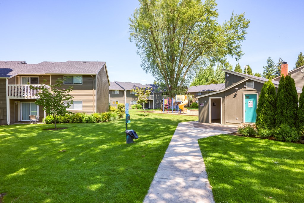 take a stroll through the manicured lawns at the whispering winds apartments in pearland, at Chalet, Springfield, 97477