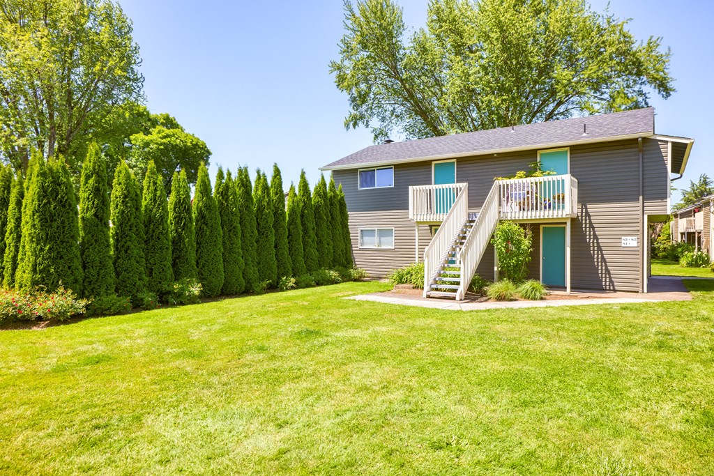 a house on a hill with a lawn in front of it at Chalet, Springfield, 97477