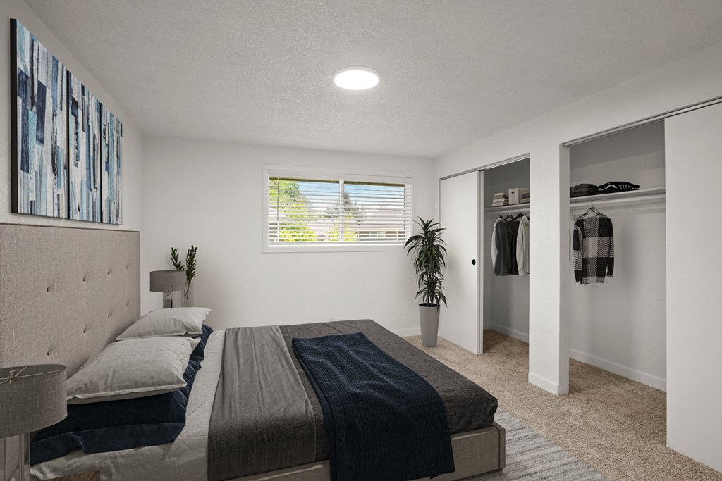 a bedroom with a bed and closet and a window at Chalet, Springfield, Oregon