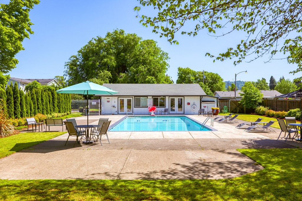 take a dip in the pool at the whispering winds apartments in pearland, tx