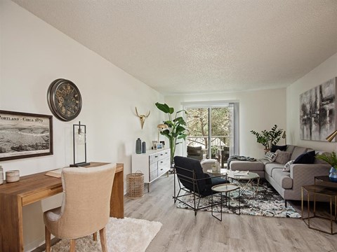 a living room with a couch and a table