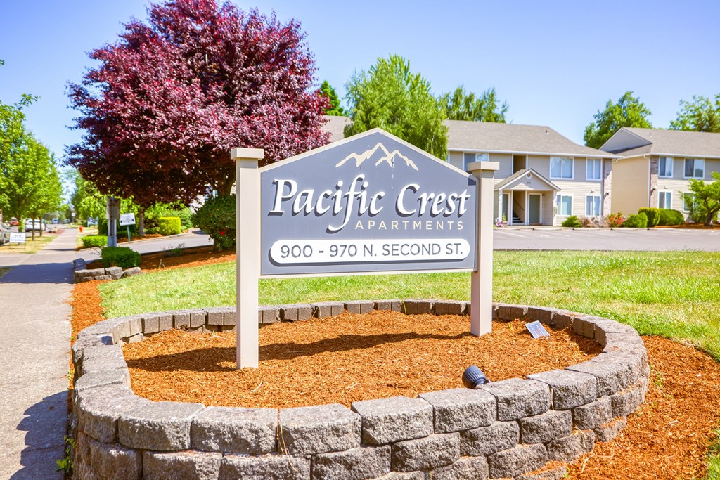 a picture of the pacific crest apartments sign