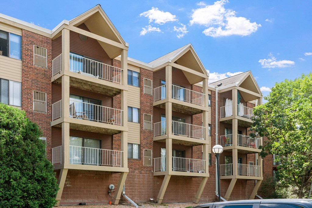 an exterior view of an apartment building with balconies