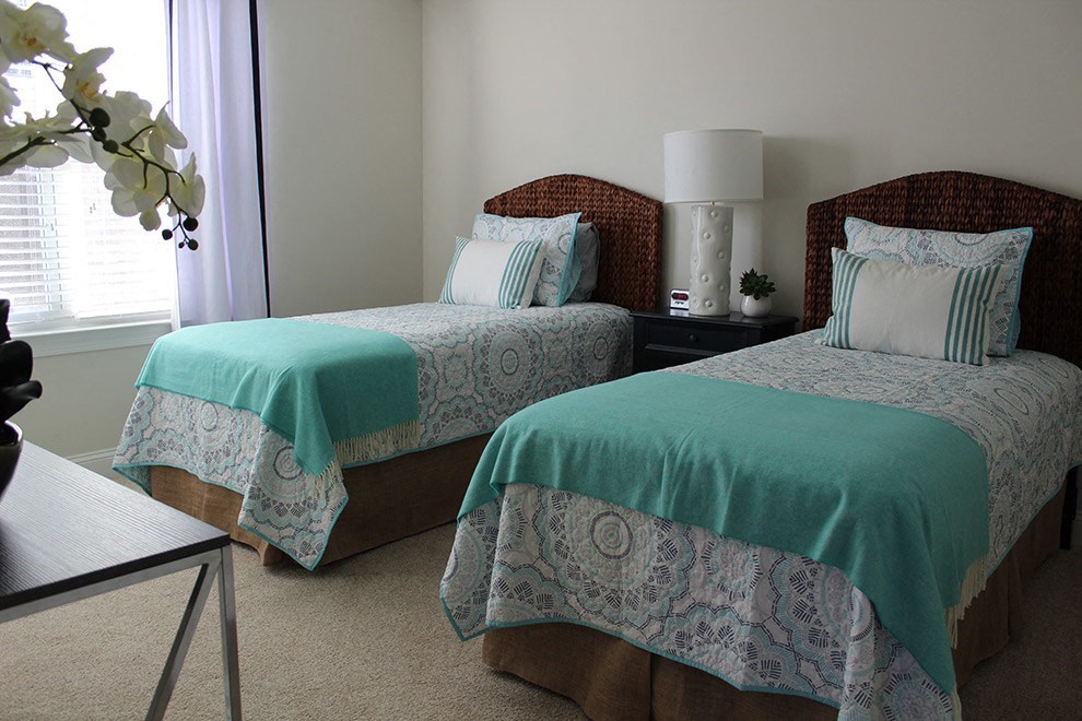Bedroom with 2 beds at The Retreat at Sumter Apartments, Sumter