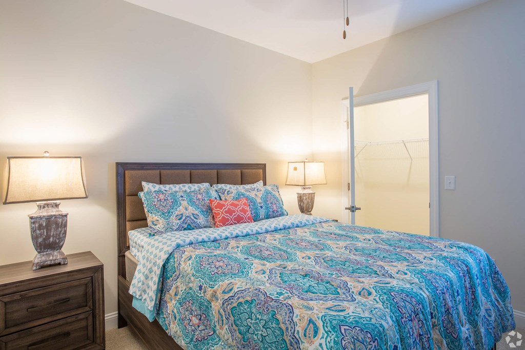 Bedroom with cozy bed at The Retreat at Sumter Apartments, Sumter, 29150