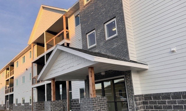 a building with awning on the side of it