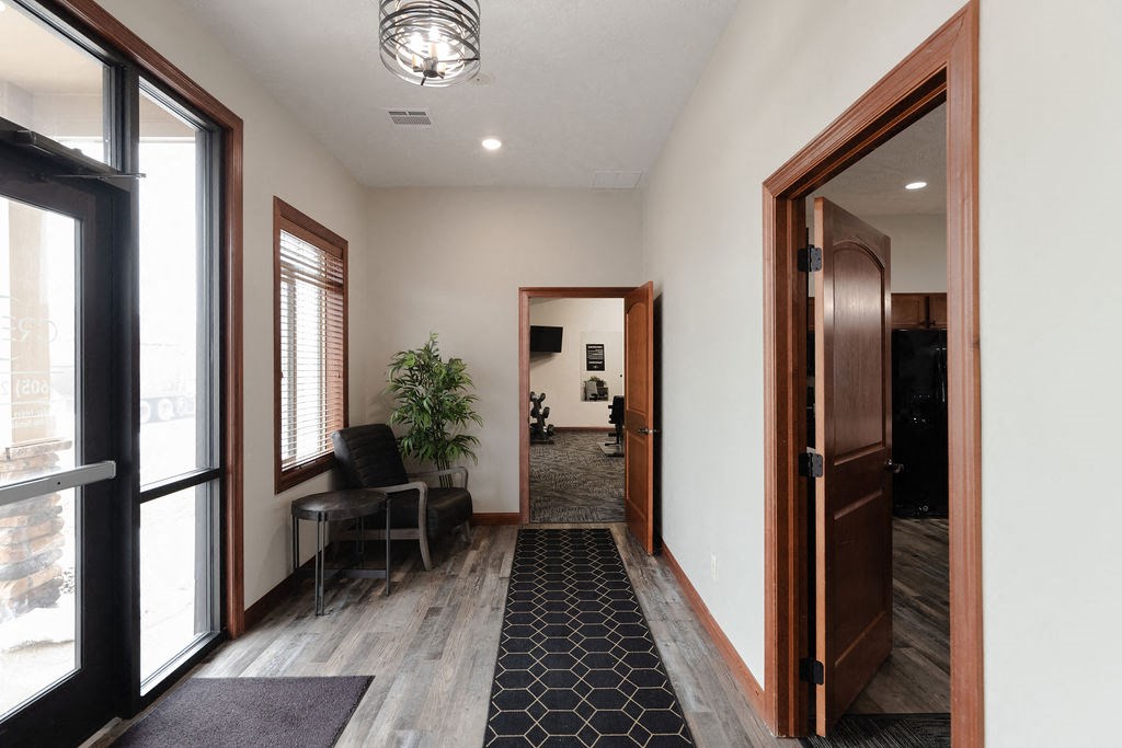 a view of the lobby from the front door of a house