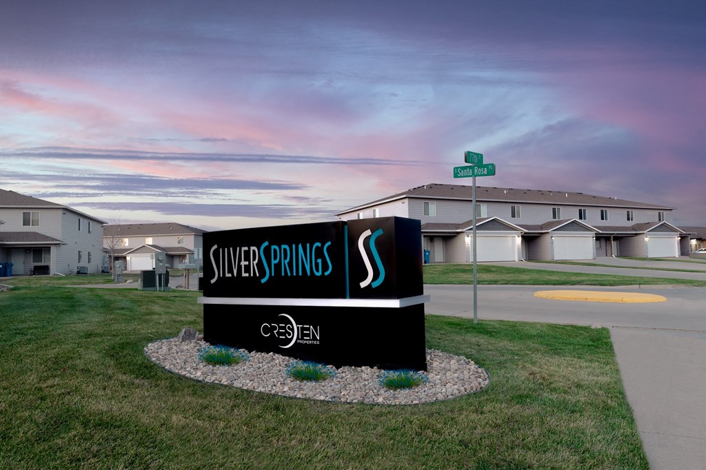 A sign for Silver Springs with a Cresten logo on it.