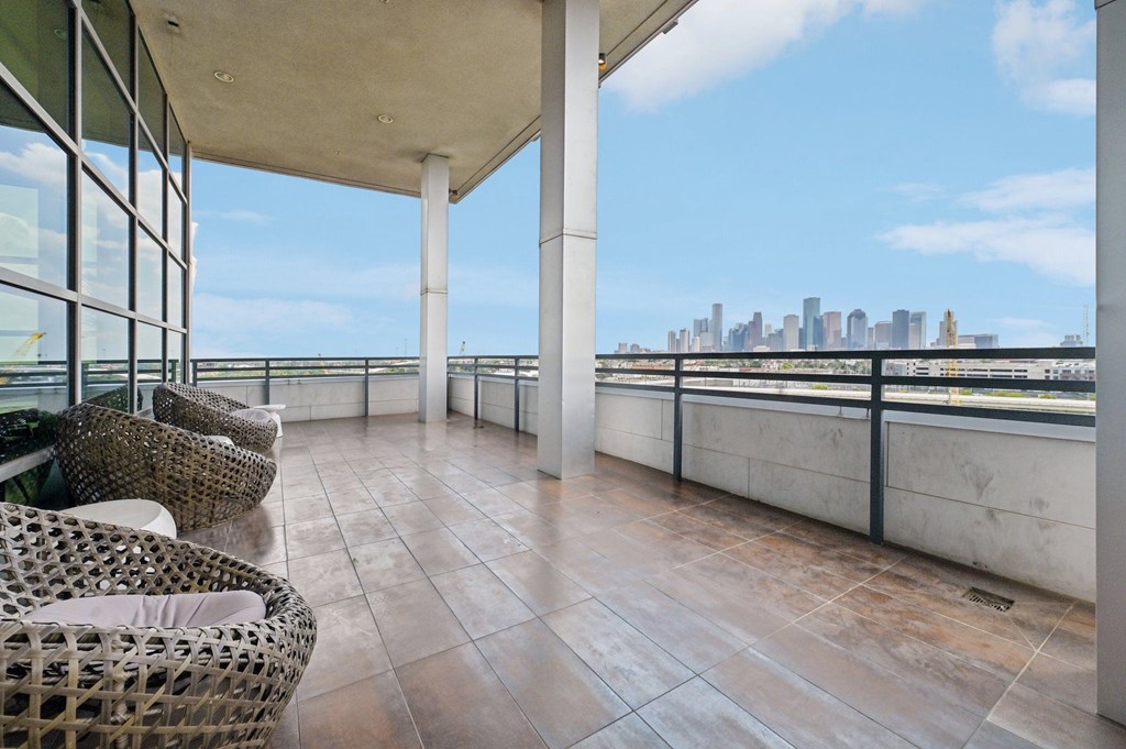 Rooftop Deck with a view of a city skyline.