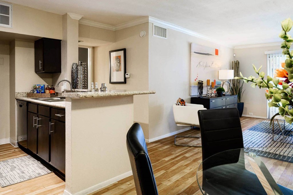 Kitchen With Dining Area View at Park at Voss Apartments, The Barvin Group, Texas, 77057