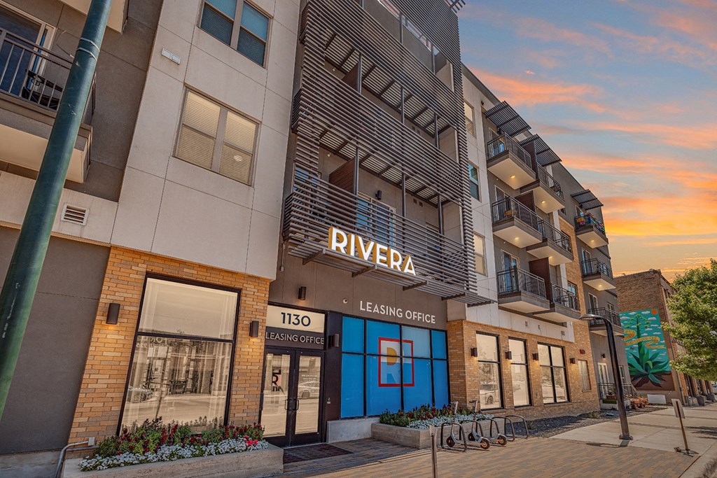 The Rivera Apartments building has a leasing office on the ground floor.