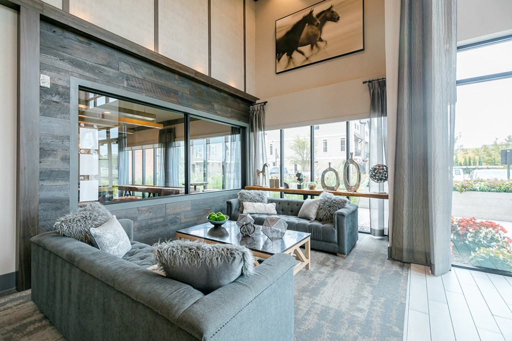 a living room with couches and a coffee table