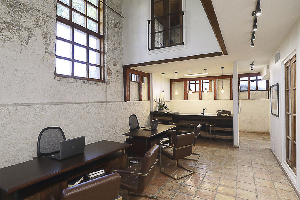 a room with tables and chairs