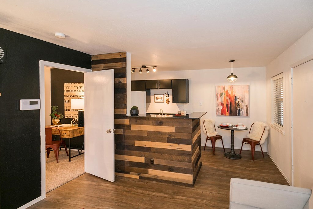 a kitchen and dining area in a 555 waverly unit