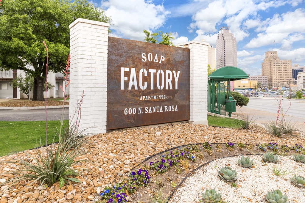 a sign for soap factory apartments in san antonio