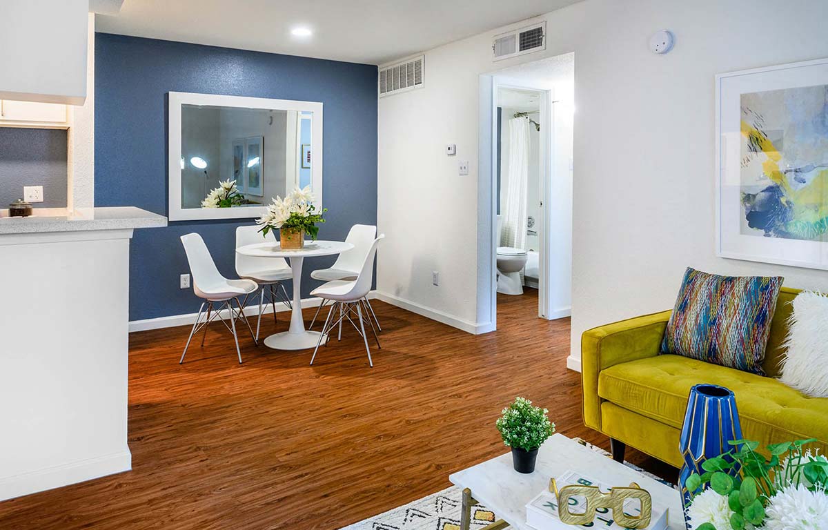 a living room with a couch and a table