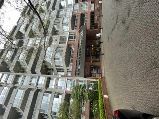 a view of a city street from a tall building