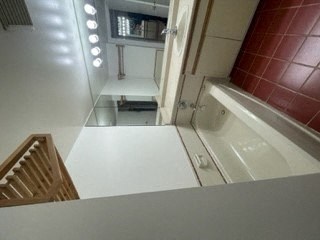 a bathroom with a sink and a bath tub