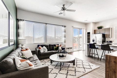 Modern Living Room With Kitchen View at Avilla Camelback Ranch, Phoenix, Arizona