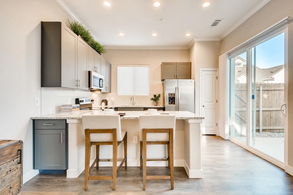 Gourmet Kitchen With Island at Avilla Oakridge, Forney, TX