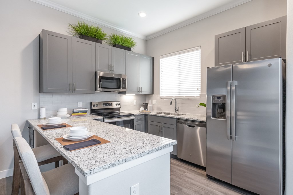 Gourmet Kitchen With Island at Avilla Lakeridge, Texas, 76002