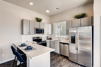 Fully Equipped Kitchen With Modern Appliances Fully Equipped Kitchen With Modern Appliances at Avilla Eastlake, Thornton, CO - Photo Gallery 4