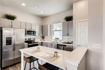 Gourmet Kitchen With Island Gourmet Kitchen With Island at Avilla Eastlake, Thornton - Photo Gallery 6