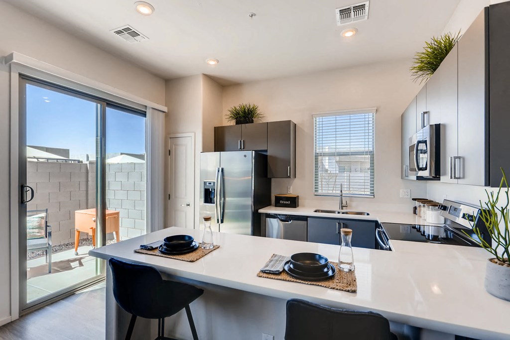 Gourmet Kitchen With Island at Avilla Centerra Crossings, Goodyear, Arizona