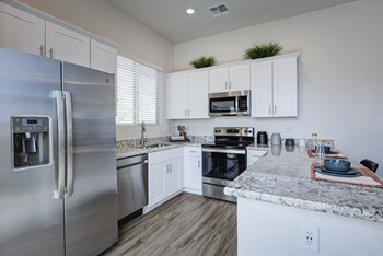 Sleek Stainless Steel Appliances Sleek Stainless Steel Appliances at Avilla Lago, Peoria, AZ - Photo Gallery 4