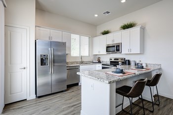 Gourmet Kitchen With Island Gourmet Kitchen With Island at Avilla Lago, Peoria, AZ - Photo Gallery 3