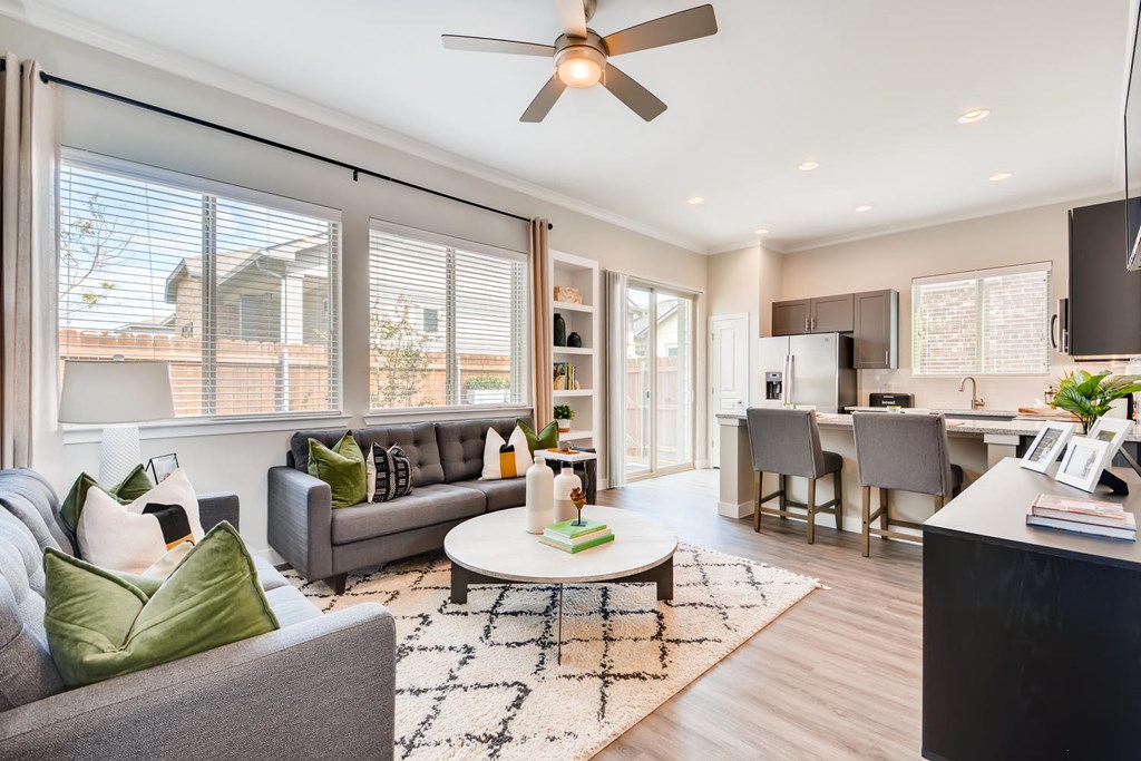 Living Room With Ceiling Fan at Avilla Heritage, Grand Prairie, Texas