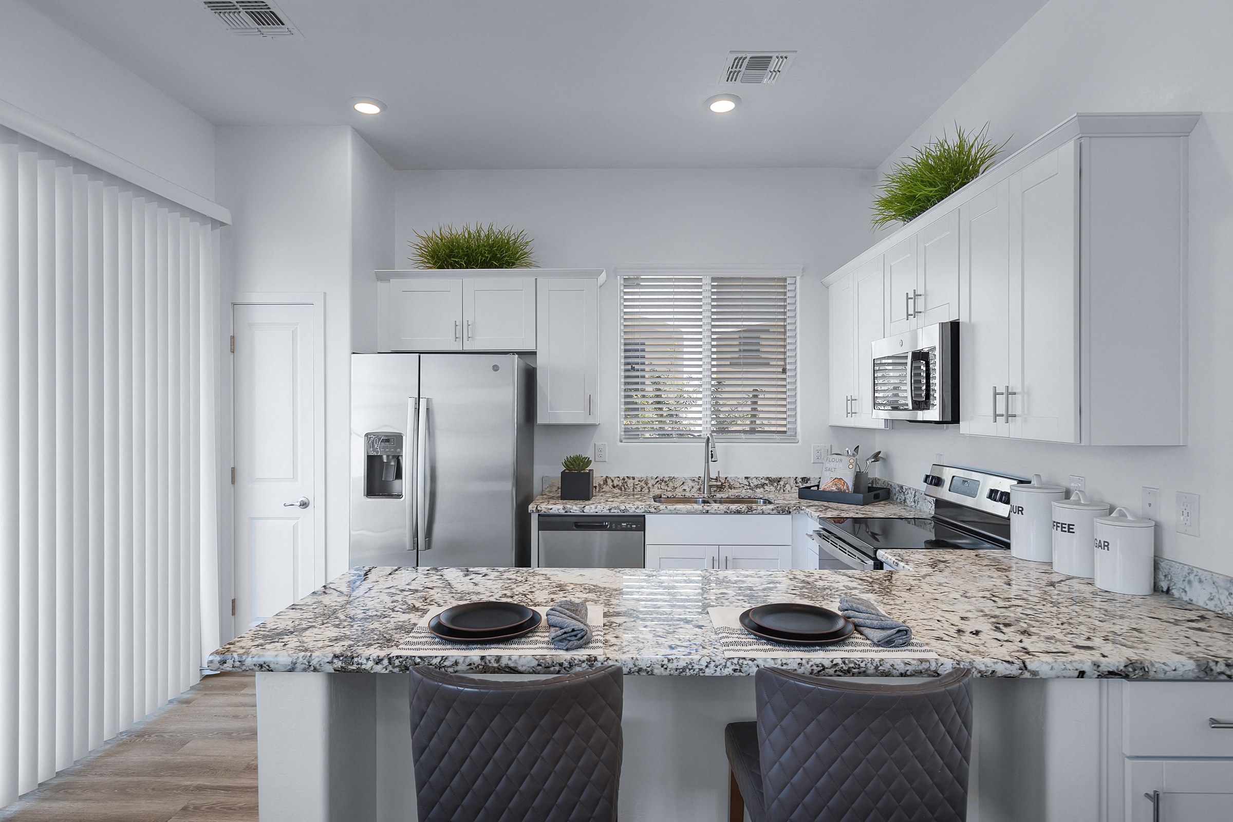 Fitted Kitchen with Island Dining at Avilla Magnolia, Phoenix, AZ, 85043