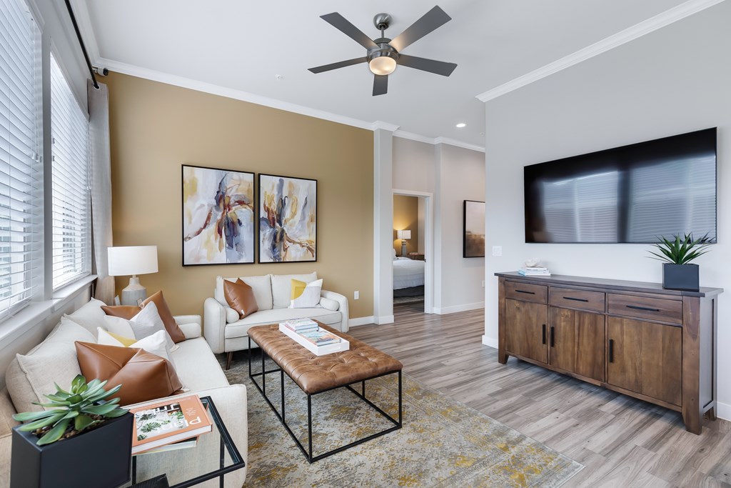 Wood plank style flooring and tall ceilings at Avilla Oakridge in Forney, TX.
