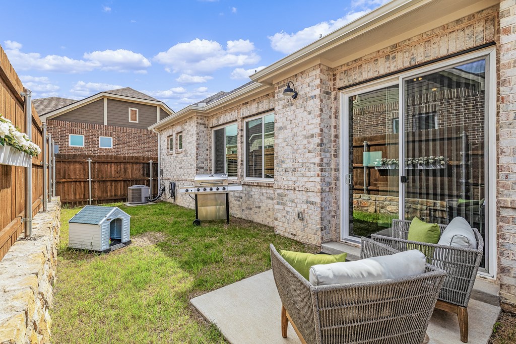 Private Backyard Sitting Area at Avilla Stoneridge, Melissa, TX, 75454