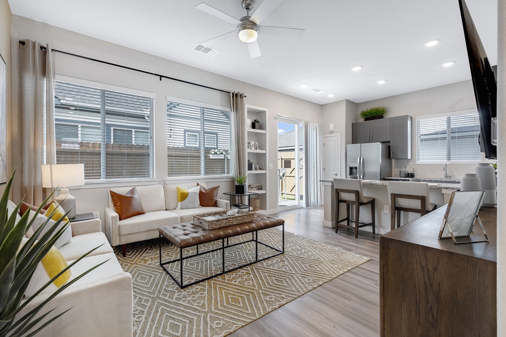 Living Room with Kitchen View at Avilla Traditions, Grand Prairie, TX 75052