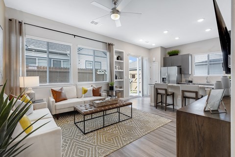 Living Room with Kitchen View at Avilla Traditions Apartments, Texas, 75052