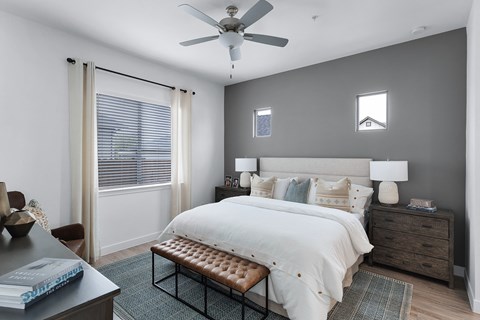 Bedroom with Expansive Windows at Avilla Rio Oaks  Apartments, Texas