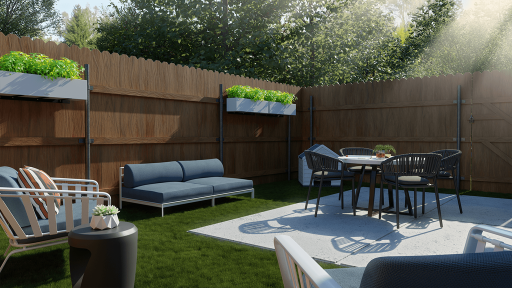 a patio with furniture and a table and chairs in a backyard