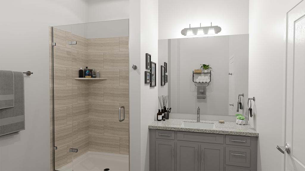 a bathroom with a shower and a sink and a mirror