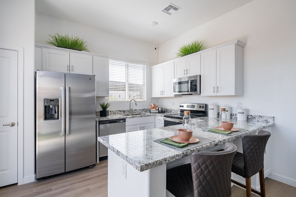 Stainless Steel Appliances and Luxury Finishes in all homes at Avilla Grand in El Mirage, AZ.