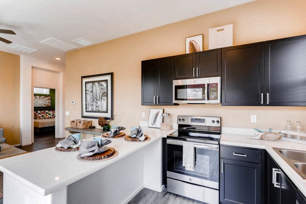 Electric Range In Kitchen at Avilla Deer Valley, Arizona, 85085