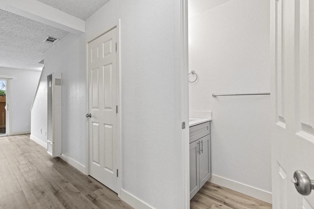 A white door is on the right side of the image at Stony Creek Apartments, California