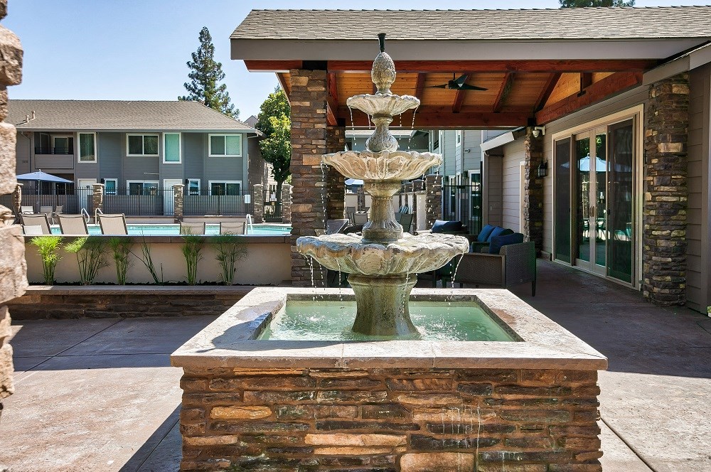 a fountain in front of a building