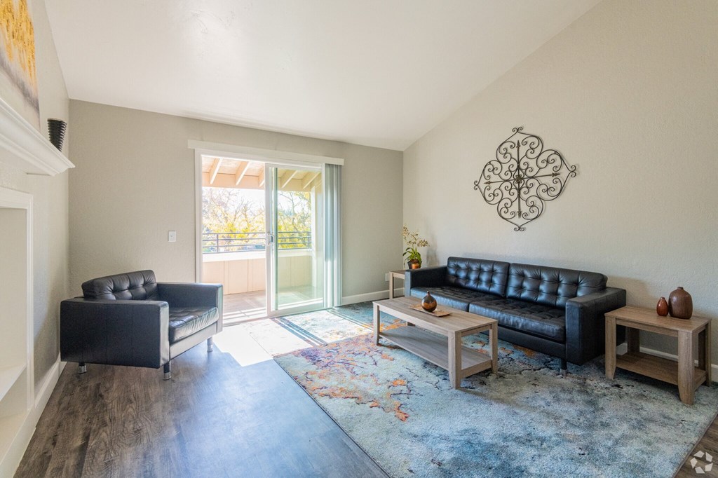 a living room with two couches and a coffee table