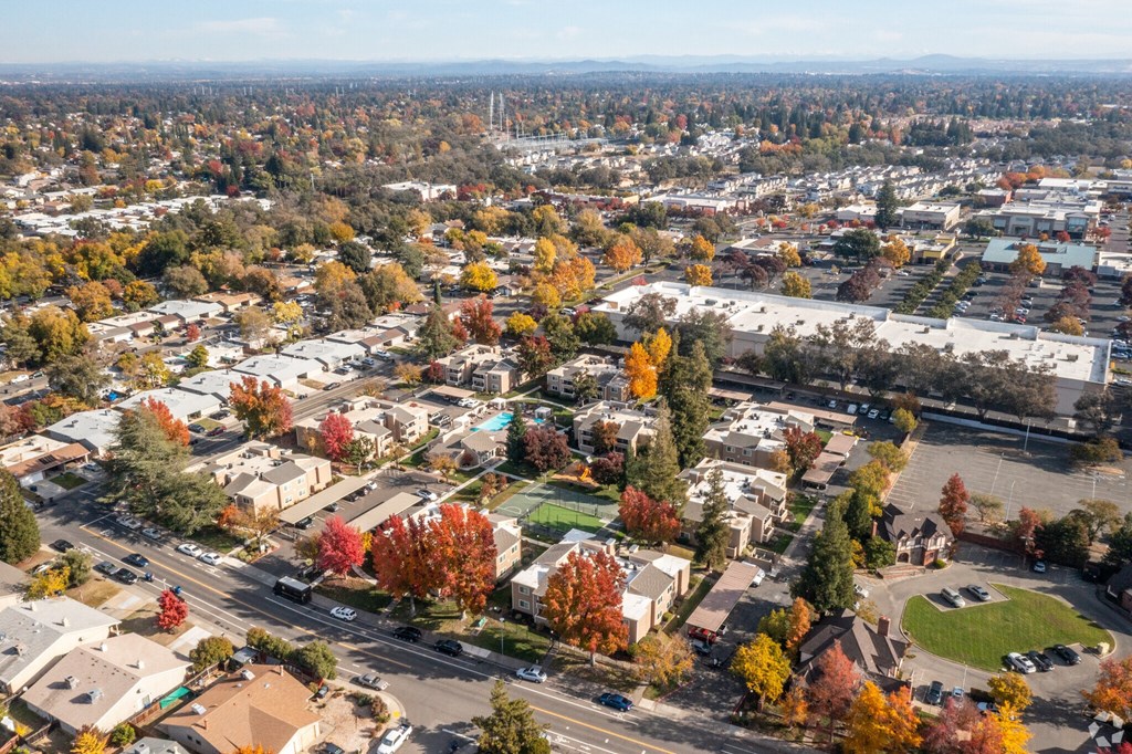 an aerial view of a city in the fall