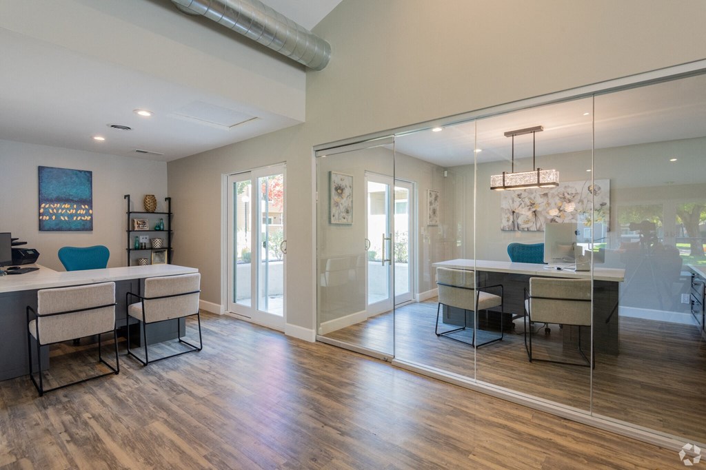 the preserve at ballantyne commons clubhouse with dining room and living room